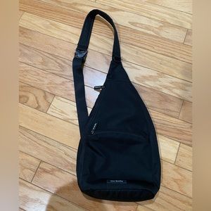 Vera Bradley canvas black sling backpack
